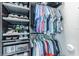 Custom closet featuring shelving and hanging rods for optimal storage at 11723 1St E St, Treasure Island, FL 33706