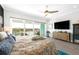 Bright main bedroom with private balcony and a beautiful view of the water at 11723 1St E St, Treasure Island, FL 33706