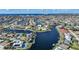 Stunning aerial view showcasing waterfront homes along a vast network of canals and beautiful surroundings at 1200 Winward Ct, Punta Gorda, FL 33950