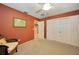 Bedroom with closet featuring neutral carpeting and natural lighting at 1200 Winward Ct, Punta Gorda, FL 33950