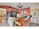 Cozy living room featuring stylish decor, a ceiling fan, and comfortable seating at 1200 Winward Ct, Punta Gorda, FL 33950