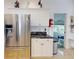 Kitchen featuring stainless steel refrigerator and white cabinets at 1286 Green Oak Trl, Port Charlotte, FL 33948