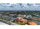 Expansive aerial view of a waterfront neighborhood, showcasing the homes and canal systems at 1344 Mediterranean Dr # 121, Punta Gorda, FL 33950