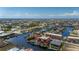 High angle view of home located on canal, revealing the private boat dock and neighborhood layout at 1344 Mediterranean Dr # 121, Punta Gorda, FL 33950