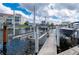 Close-up view of boat lift on canal at 1344 Mediterranean Dr # 121, Punta Gorda, FL 33950