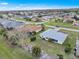 Aerial view of the neighborhood highlighting lush landscaping and home exteriors at 1364 Ultramarine Ln, Punta Gorda, FL 33983