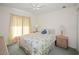 Bedroom featuring carpet, ceiling fan, bright natural light, and neutral walls at 1364 Ultramarine Ln, Punta Gorda, FL 33983