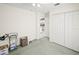 Bedroom with closet and adjacent doorway into the kitchen at 1364 Ultramarine Ln, Punta Gorda, FL 33983