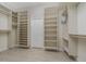 Large walk-in closet with custom shelving, rod hanging and storage at 1453 Wren Ct, Punta Gorda, FL 33950