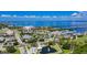 Beautiful aerial view of the town with a marina, waterway, and the John Ringling Causeway at 150 Harborside Ave # 122, Punta Gorda, FL 33950