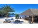 Outdoor tiki bar with beach access and plenty of seating at 150 Harborside Ave # 122, Punta Gorda, FL 33950