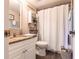 Charming bathroom featuring granite countertop, modern fixtures, and coastal-themed decor at 1515 Forrest Nelson Blvd # D103, Port Charlotte, FL 33952