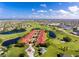 Extensive community showcasing pools, lakes, golf course, and residential buildings at 1640 Atares Dr # 21, Punta Gorda, FL 33950