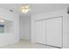 Bedroom with ceiling fan and large closet at 1640 Atares Dr # 21, Punta Gorda, FL 33950