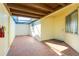 Inviting outdoor entrance area with brick floor, a translucent roof, and a secure front door at 1640 Atares Dr # 21, Punta Gorda, FL 33950