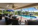 Enclosed pool with an outdoor seating area at 19179 Aviation Ct, Port Charlotte, FL 33948