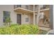 Entrance to condo featuring door and stairs at 1999 Kings Hwy # 21A, Punta Gorda, FL 33980