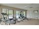 Community gym featuring modern cardio and weightlifting equipment with natural light at 1999 Kings Hwy # 21A, Punta Gorda, FL 33980