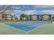 Community tennis courts for active residents with well-maintained playing surface at 1999 Kings Hwy # 21A, Punta Gorda, FL 33980