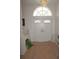 Elegant foyer featuring tile flooring and double doors at 223 Valdiva St, Punta Gorda, FL 33983