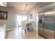 Dining area with chandelier and stainless refrigerator at 23144 Donalda Ave, Port Charlotte, FL 33954