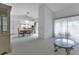 Bright living room with vaulted ceiling, neutral colors, dining area, and ample natural light at 23411 Superior Ave, Port Charlotte, FL 33954