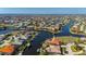 Aerial view of waterfront homes and canals offering boating and a picturesque coastal lifestyle at 237 Freeport Ct, Punta Gorda, FL 33950