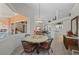 Breakfast nook with a mosaic table and views of the living room and kitchen at 237 Freeport Ct, Punta Gorda, FL 33950