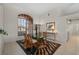 Bright dining room with a large window, stylish rug, and elegant table setting at 237 Freeport Ct, Punta Gorda, FL 33950