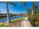 View of the waterfront from this home's backyard with boat dock at 237 Freeport Ct, Punta Gorda, FL 33950