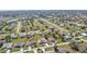 High-angle aerial shot of a community featuring single-Gathering homes and mature landscaping at 27566 Tierra Del Fuego Cir, Punta Gorda, FL 33983