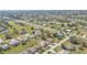 Birds-eye view of a suburban neighborhood, complete with roadways and green spaces at 27566 Tierra Del Fuego Cir, Punta Gorda, FL 33983