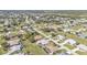 Comprehensive aerial shot showing the layout of a suburban area and its surroundings at 27566 Tierra Del Fuego Cir, Punta Gorda, FL 33983