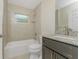 Bathroom featuring a shower and tub combination at 2851 Verde Ter, North Port, FL 34286