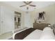 Light and airy bedroom featuring a ceiling fan and a closet at 2851 Verde Ter, North Port, FL 34286