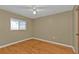 Bedroom featuring a ceiling fan and hardwood floors at 295 Porto Alegre St, Punta Gorda, FL 33983