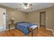 Bedroom with a ceiling fan, closet and hardwood floors at 295 Porto Alegre St, Punta Gorda, FL 33983