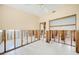 Bright room featuring tiled floors, a ceiling fan, a window and partially renovated walls at 3120 Wisteria Pl, Punta Gorda, FL 33950