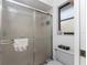 Shower with sliding glass doors at 349 Grenada St, Port Charlotte, FL 33948