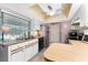 Kitchen featuring white cabinets, stainless steel appliances, wood countertop and decorative ceiling at 349 Grenada St, Port Charlotte, FL 33948