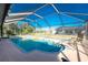 Screened-in swimming pool, showcasing the outdoor living space and backyard at 349 Grenada St, Port Charlotte, FL 33948