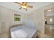 Bright bedroom features ceiling fan, closet, and plenty of natural light at 3615 Sleepy Hollow Ln, Punta Gorda, FL 33950