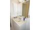 Bathroom with a white vanity, updated faucet, and a framed mirror for a clean look at 4000 Bal Harbor Blvd # 527, Punta Gorda, FL 33950