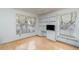 Bedroom with hardwood flooring and built in bookcase at 10256 Shadow Run Ct, Punta Gorda, FL 33955