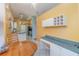 Cozy breakfast nook adjacent to kitchen with ample counter space at 10256 Shadow Run Ct, Punta Gorda, FL 33955