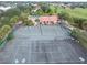 Community tennis courts and clubhouse offer residents an active lifestyle at 10256 Shadow Run Ct, Punta Gorda, FL 33955