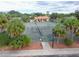 Aerial view of the community tennis courts, perfect for active residents at 10256 Shadow Run Ct, Punta Gorda, FL 33955