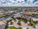 An aerial view of a single Gathering home in a waterfront community at 1217 Bobwhite Court, Punta Gorda, FL 33950