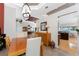 Dining area featuring a chandelier, tile flooring, and views of the living room and kitchen at 1217 Bobwhite Court, Punta Gorda, FL 33950