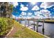Private dock with boat lift along canal at 1217 Bobwhite Court, Punta Gorda, FL 33950